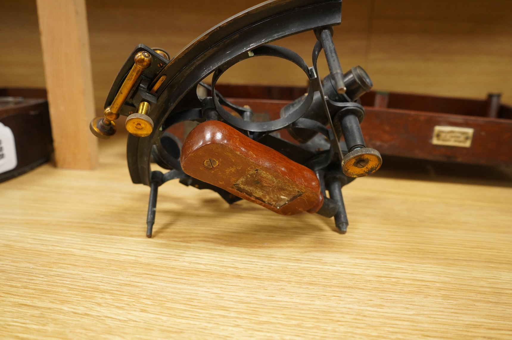 An early 20th century brass and lacquered sextant without maker’s mark, the mahogany case containing three eyepieces, card certificate of examination by the National Physical Laboratory screwed to the inside of the lid a